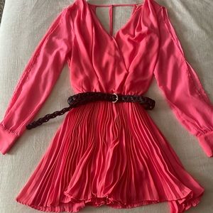 Casual cocktail dress with belt.